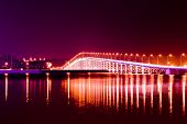 stock photo of bridge  - The bridge across the island at night on the island of Macao - JPG 