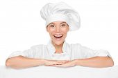 pic of multicultural  - Chef or baker woman showing sign billboard excited smiling happy presenting menu or your copy isolated on white background - JPG 