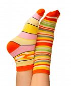 stock photo of over white  - Foots in stripped socks over white - JPG 