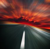 foto of pressure  - Blurred asphalt road and red bloody blurred sky - JPG 