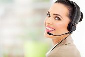 picture of telemarketing  - cheerful female call center telemarketer with headset - JPG 