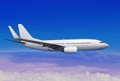 image of blue  - white passenger aircraft in the blue sky landing away - JPG 