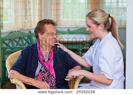 Picture or Photo of A nurse home care visits a patient