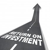foto of investment  - The words Return on Investment on a road leading upward - JPG 