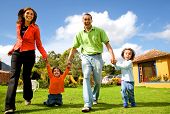 image of family  - happy family having fun outdoors at home on a sunny day - JPG 