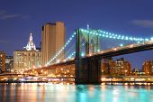 picture of bridge  - New York City Manhattan skyline and Brooklyn Bridge at dusk over Hudson River with skyscrapers - JPG 