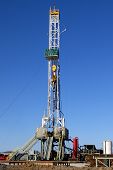 picture of nature  - Natural Gas Exploration Drilling Rig blue sky in background - JPG 