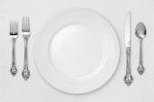 stock photo of setting  - White Place Setting on tablecloth with a clipping path - JPG 
