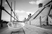 pic of buildings  - empty building site with left helmet on scaffold - JPG 