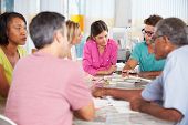 stock photo of meeting  - Team Meeting In Creative Office - JPG 