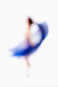 Out Of Focus Image Of A Woman With Blue Cloth