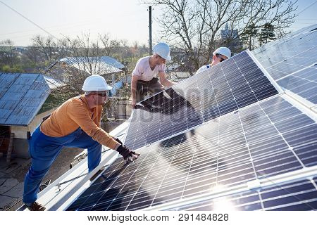 Poster: Male Workers Installing Solar Photovoltaic