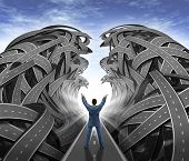 image of leadership  - Business Management with a businessman with his arms in the air parting the sea of confused tangled roads and highways to open a clear path to success as a leadership financial concept of overcoming challenges - JPG 