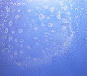 stock photo of conglomerate  - abstract wet blue background with soap bubble conglomerations - JPG 