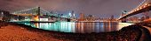 picture of bridge  - New York City Manhattan Bridge and Brooklyn Bridge with downtown skyline panorama over East River at night - JPG 