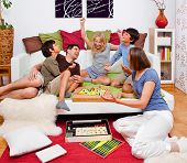 foto of game  - a young family is playing board - JPG 