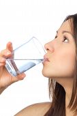 image of woman  - Woman drinking water from clear glass healthy lifestyle weight loss concept isolated on a white background - JPG 