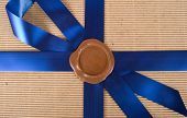picture of credence  - Closeup of wax seal at gift box - JPG 
