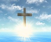 image of religion  - wooden cross in front of sun on the religion theme - JPG 
