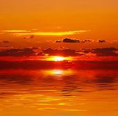 stock photo of sunset  - Sunset over water - JPG 