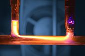 stock photo of discharge  - Yellow plasma discharge in tube blue background with cooling fan - JPG 