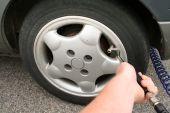 stock photo of pressure  - pump or inflate car tyre - JPG 