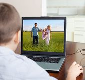 picture of computer  - Child playing a computer at home - JPG 
