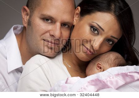 Picture or Photo of Happy Young Attractive Mixed Race Family with Newborn Baby.