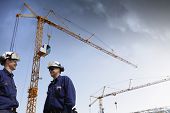 picture of construction  - construction workers with mobile - JPG 