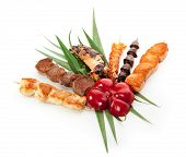 foto of food  - Grilled Foods Garnished with Green Leaves and Paprika - JPG 
