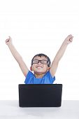 pic of toddlers  - Happy Asian toddler with glasses using laptop computer isolated on white - JPG 