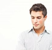 stock photo of man  - Handsome young man portrait looking down at the corner - JPG 