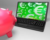 foto of finance  - Euro Symbols On Laptop Showing European Finances And Wealth - JPG 