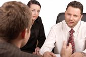 pic of meeting  - three persons business meeting    - JPG 