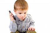picture of talking  - Cute little boy talking on a mobile phone - JPG 