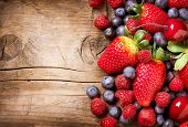 picture of health  - Berries on Wooden Background - JPG 