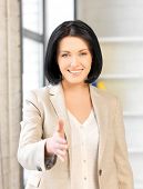 foto of handshake  - lovely woman with an open hand ready for handshake - JPG 