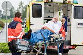 picture of transportation  - Oxygen mask male patient ambulance stretcher emergency transport hospital - JPG 