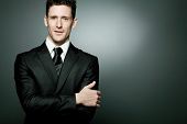 picture of business people  - Young handsome businessman in black suit - JPG 