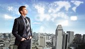 picture of future technology  - Business person standing against modern virtual technology background - JPG 