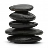 image of steady  - stack of balanced zen stones isolated on white background - JPG 