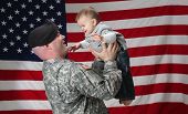 stock photo of infants  - An American soldier holds his infant son - JPG 