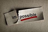 picture of business concept  - Word impossible transformed into possible - JPG 