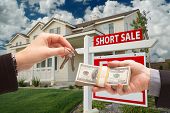 picture of cash  - Handing Over Cash For House Keys and Short Sale Real Estate Sign in Front of Home - JPG 