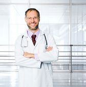 image of medical doctors  - medical doctor with stethoscope over clinic  background - JPG 