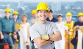 stock photo of group  - Smiling Construction worker man - JPG 