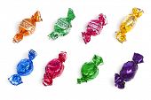 stock photo of wrapped  - assortment of wrapped candy on white background - JPG 