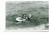 picture of  photo  - Vintage photo of mother and daughter swimming in sea  - JPG 