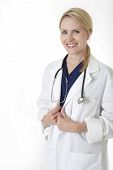image of medical doctors  - attractive lady doctor in white lab coat with stethoscope around shoulders - JPG 