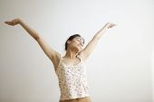picture of wake  - Young adult woman stretching - JPG 